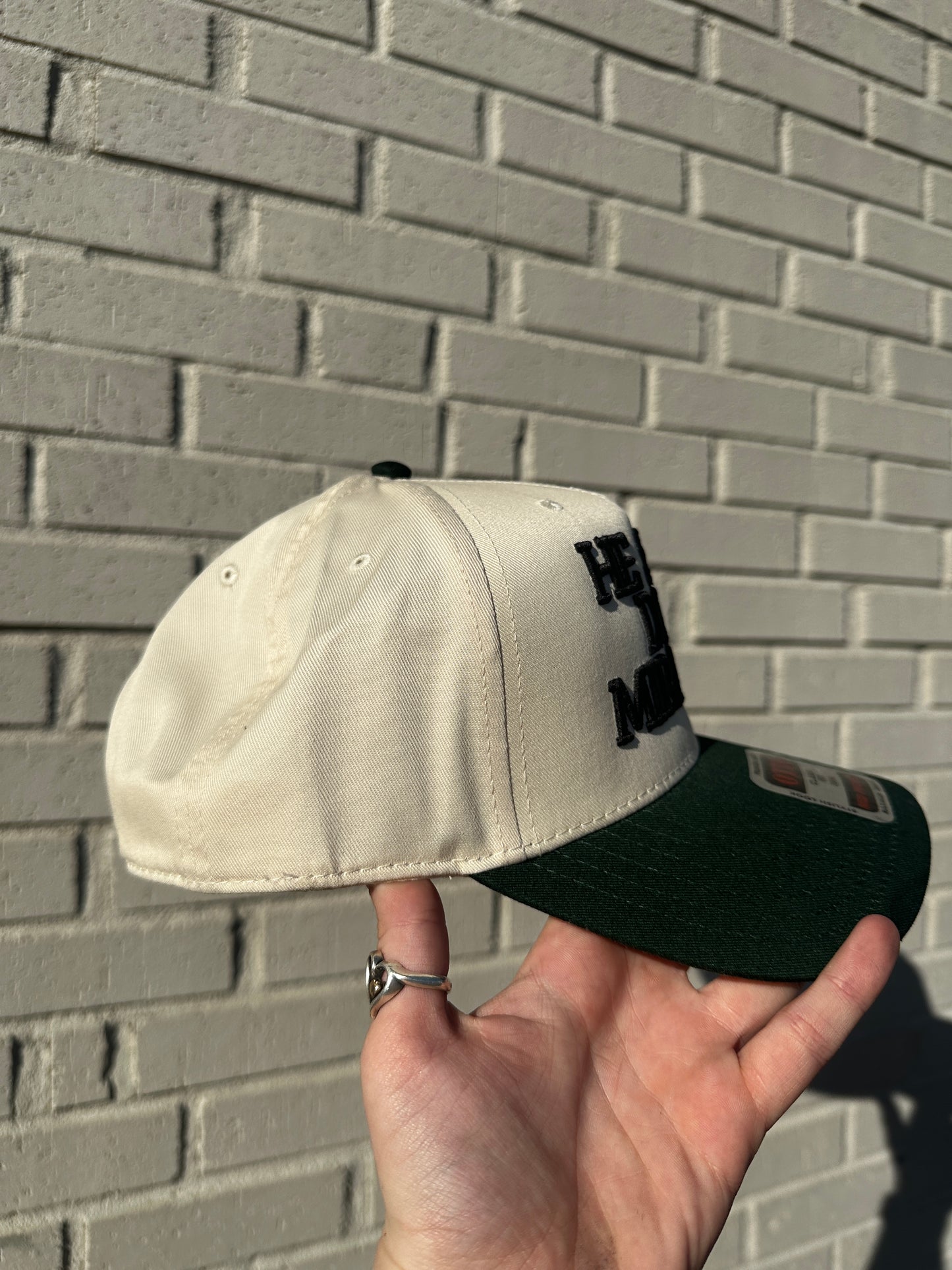 He Still Does Miracles Embroidered Trucker Hat