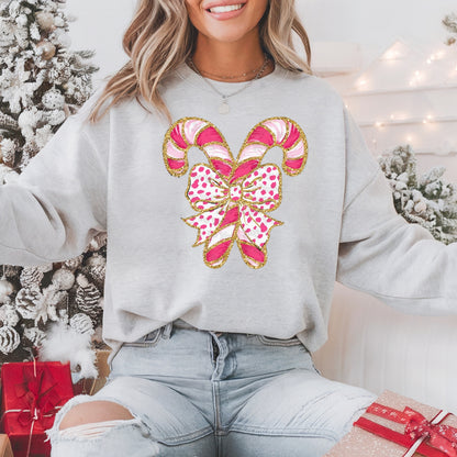 Pink Candy Cane Bow Christmas Pullover Sweatshirt, Women's Holiday Crewneck