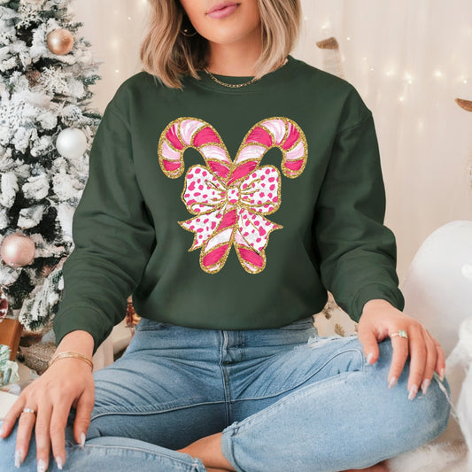 Pink Candy Cane Bow Christmas Pullover Sweatshirt, Women's Holiday Crewneck